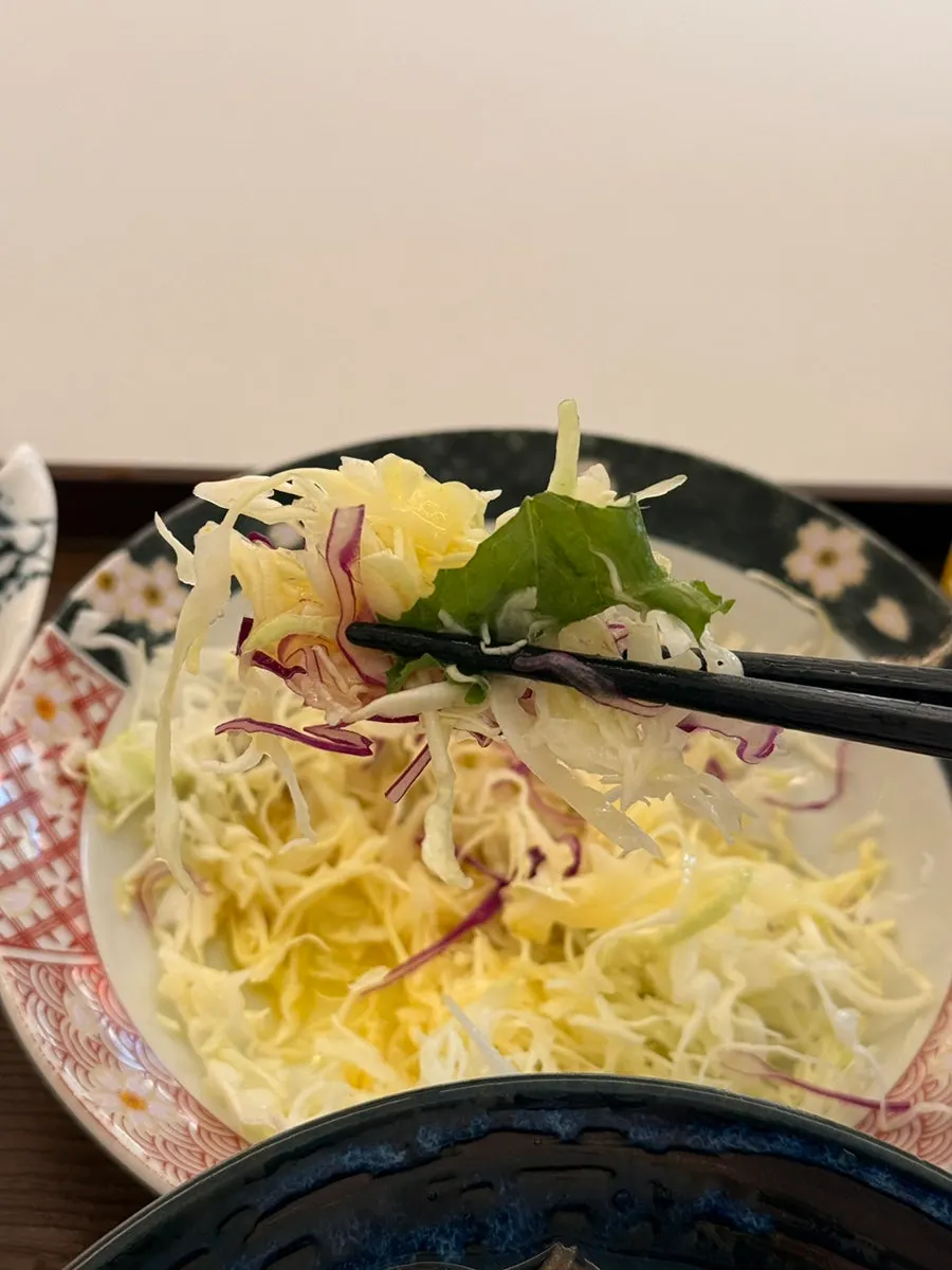 Side dishes served alongside the flame-seared sushi