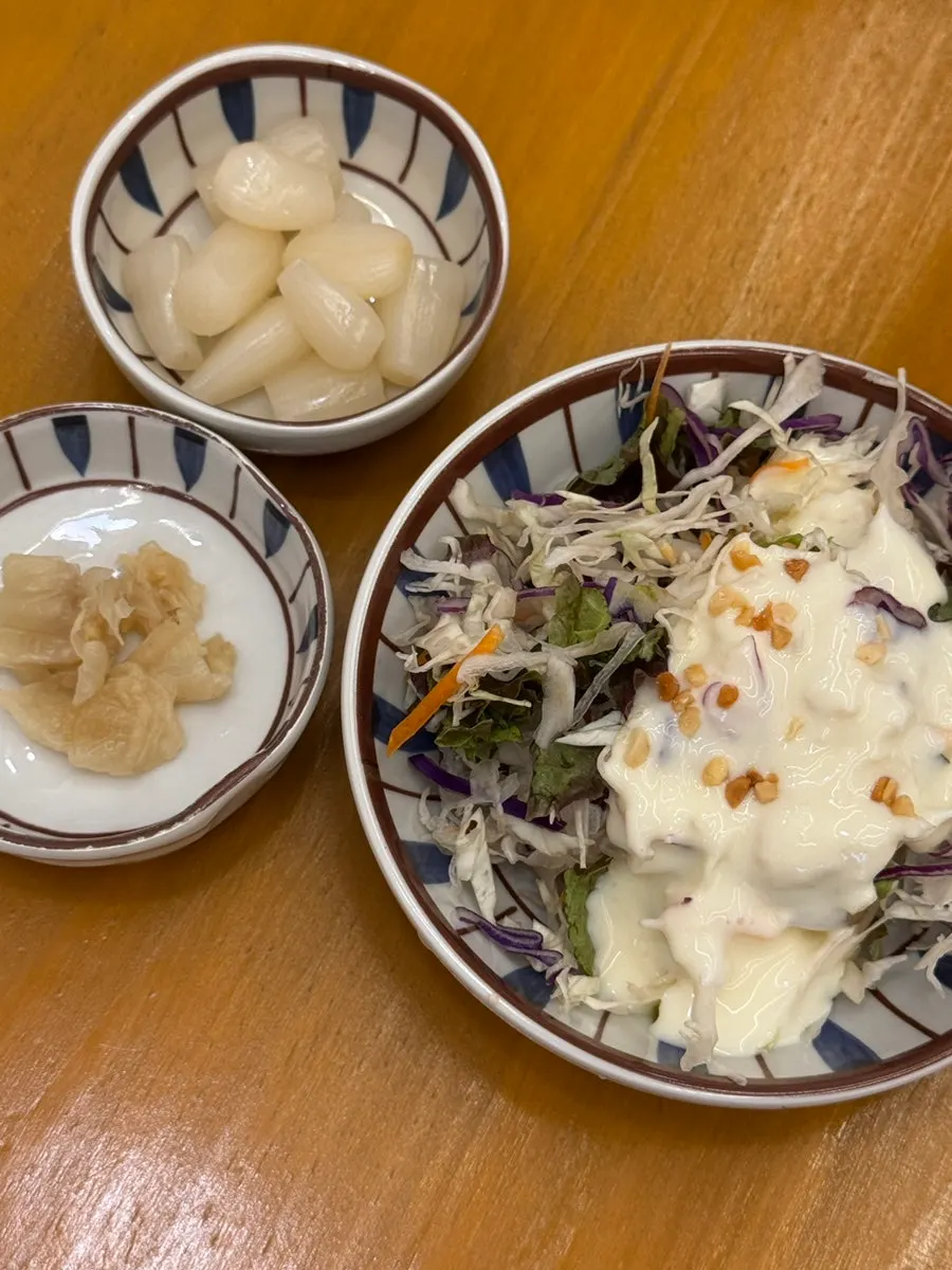 White kimchi and salad included with the meal