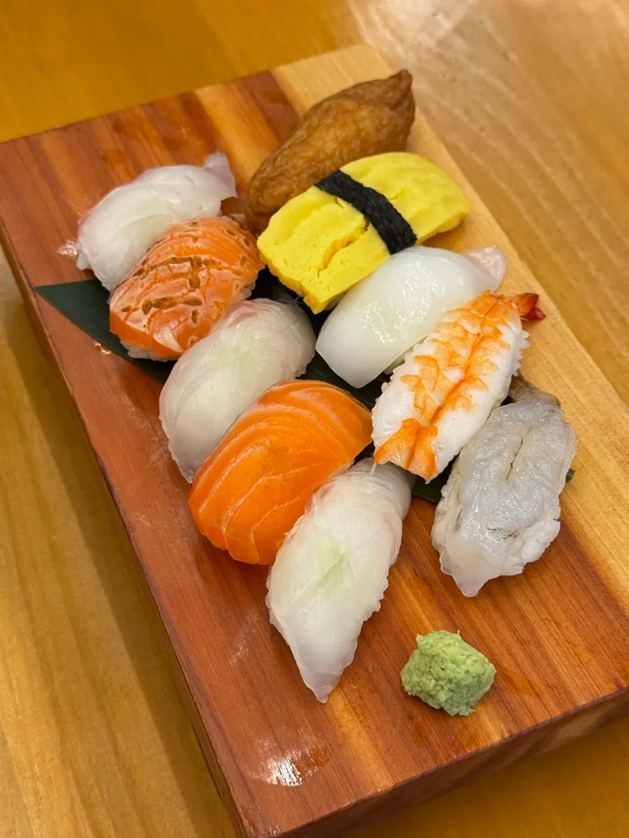 A platter of assorted sushi with 10 pieces