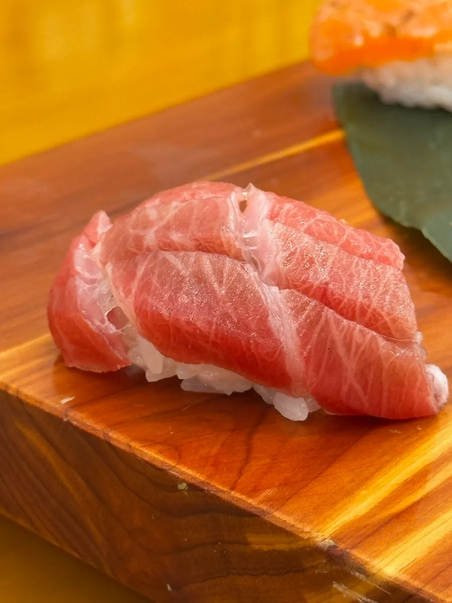 A single piece of sushi served on a plate
