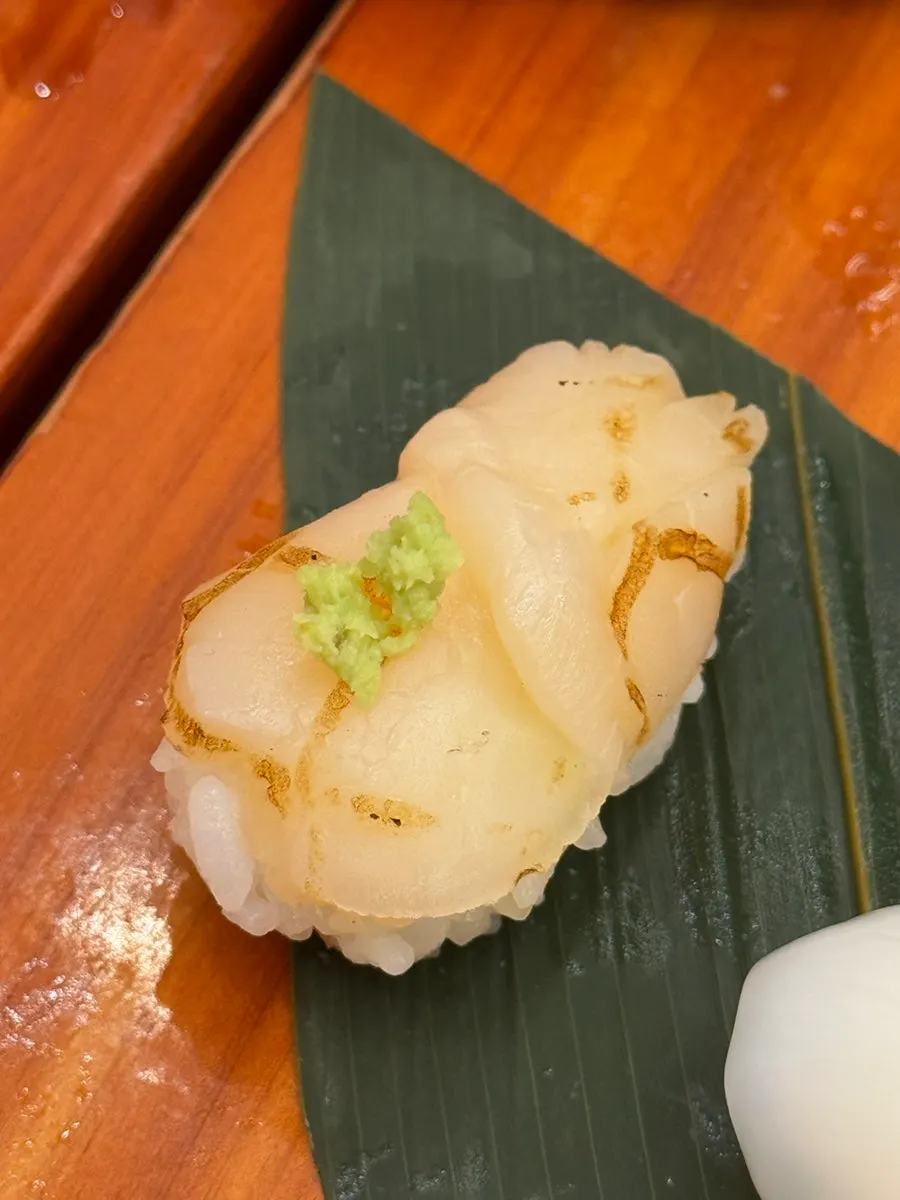 A piece of fatty tuna belly sushi