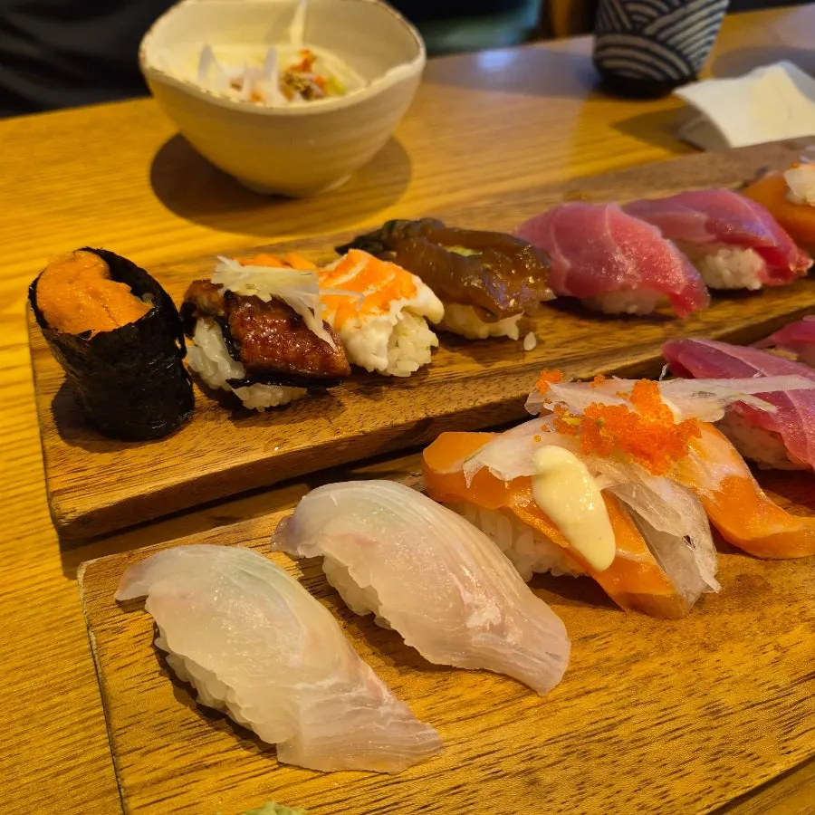 Special sushi with sea urchin gunkan and eel nigiri mixed in