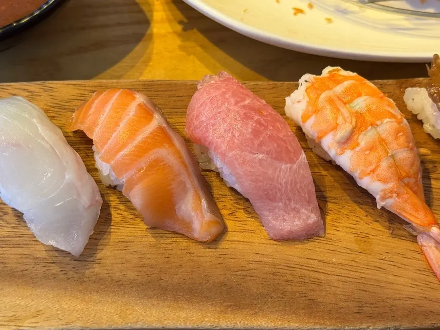 Assorted 16-piece nigiri platter with flounder, salmon, tuna and more