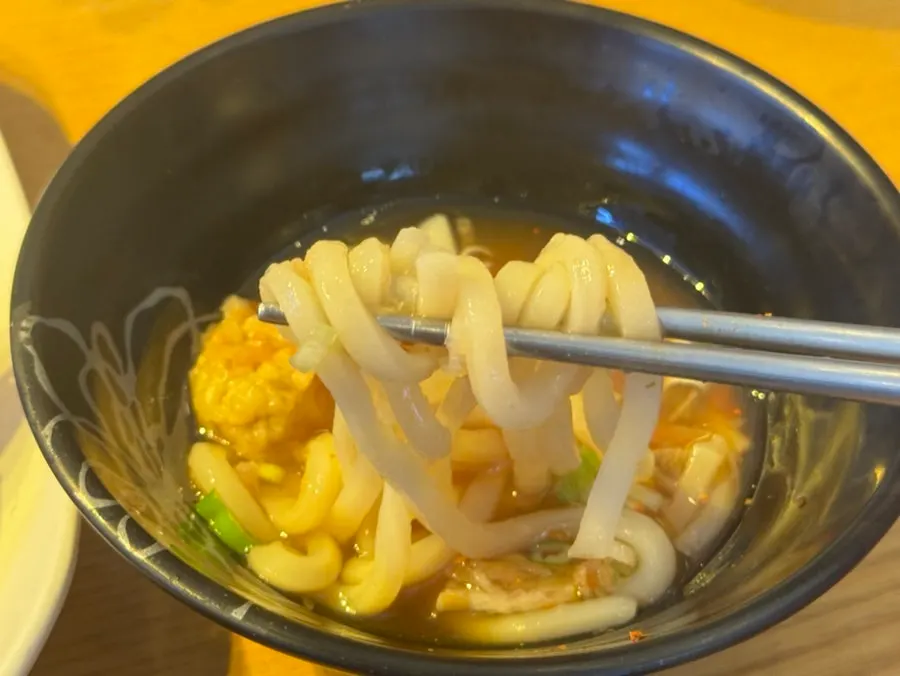 Bowl of mini udon with bouncy, chewy noodles