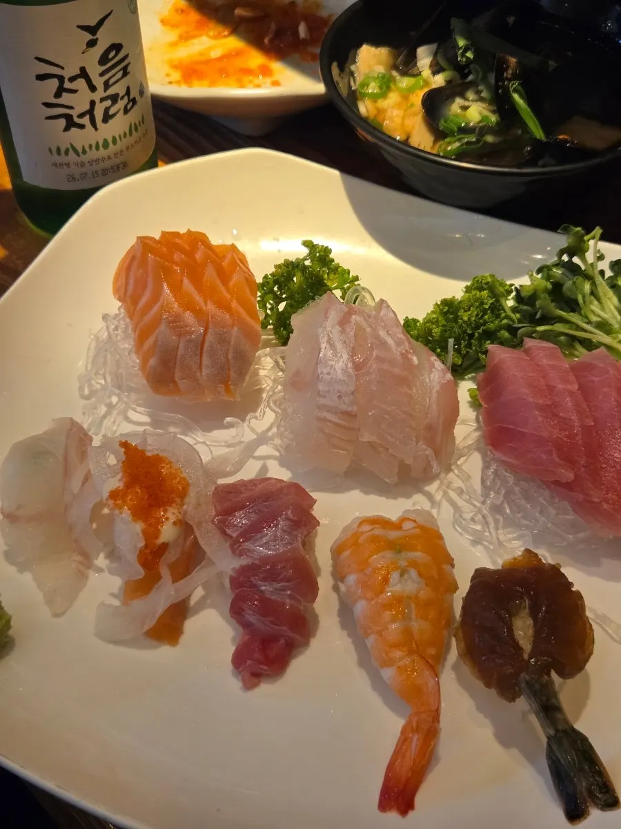 Sashimi served with soy sauce and wasabi