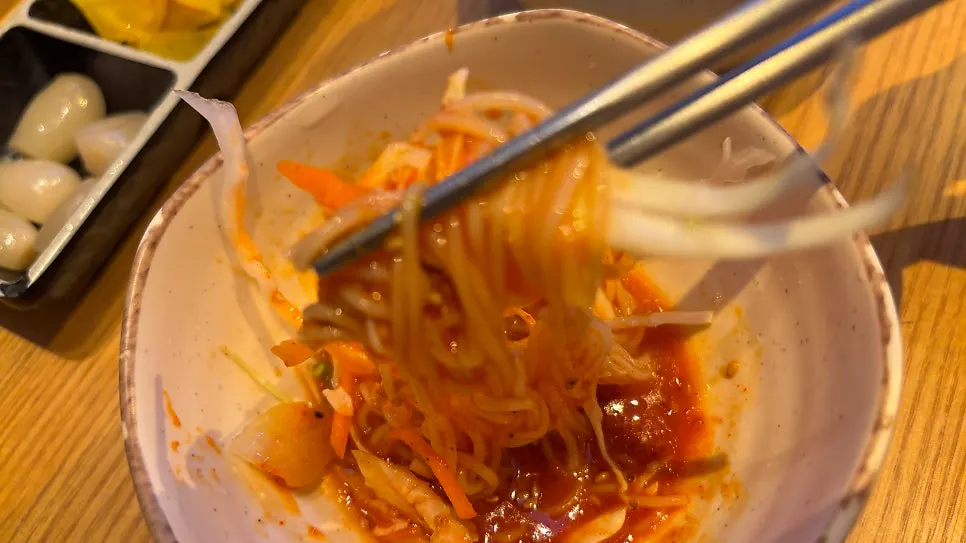 Sweet and tangy jjolmyeon served before the meal