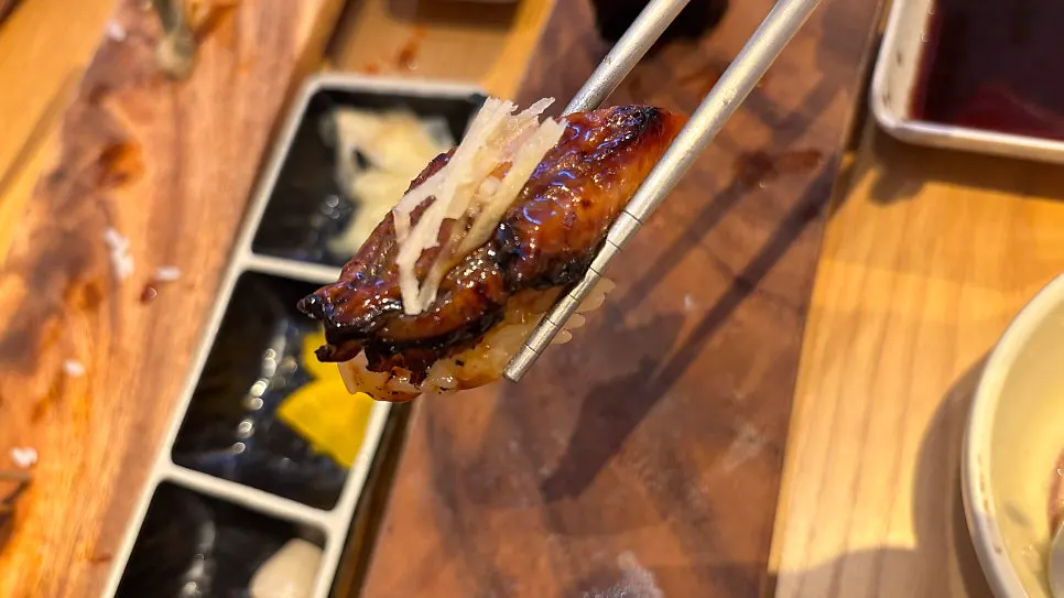 Eel sushi topped with sauce