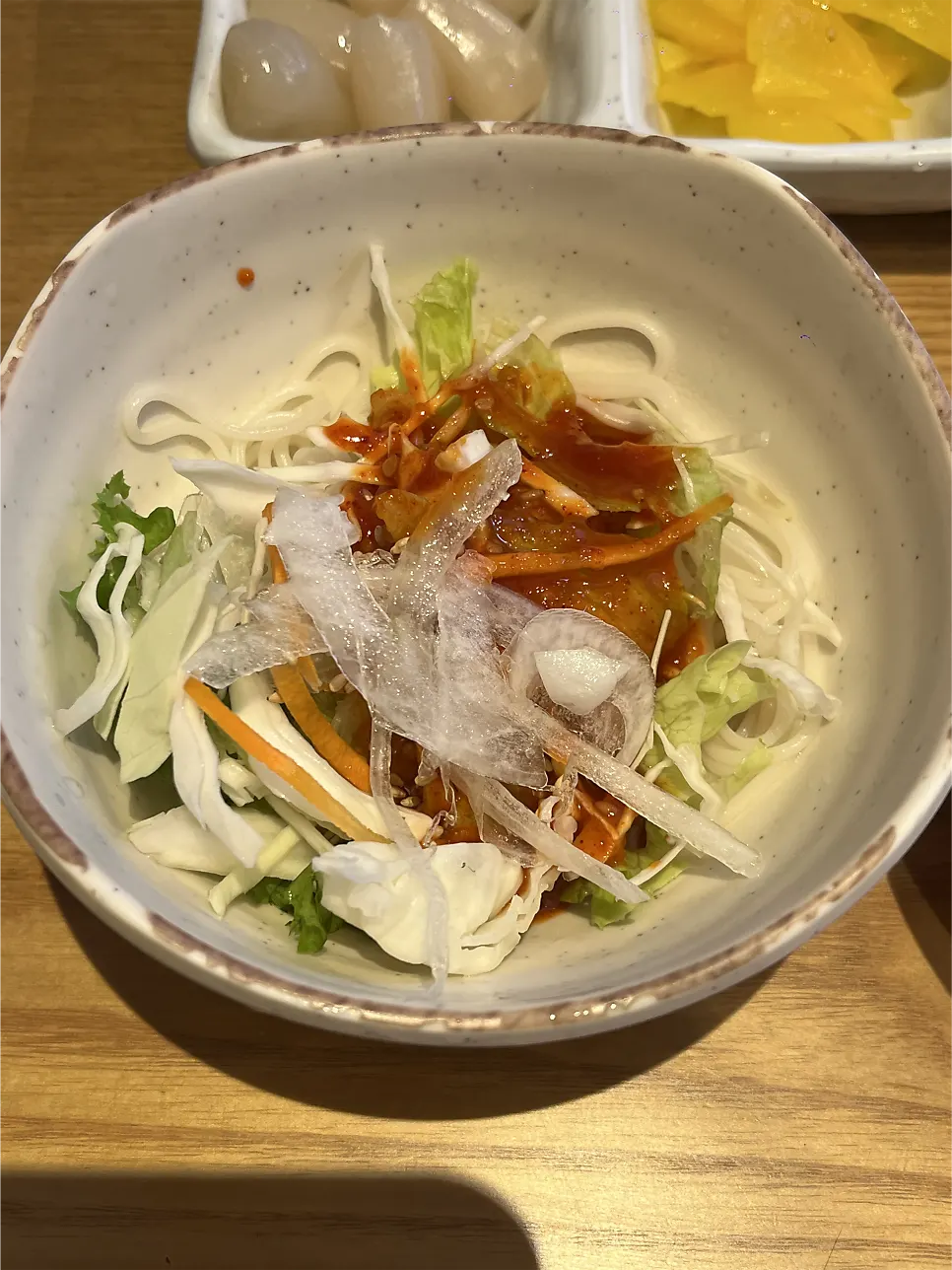 A bowl of tangy-sweet vinegar noodle salad
