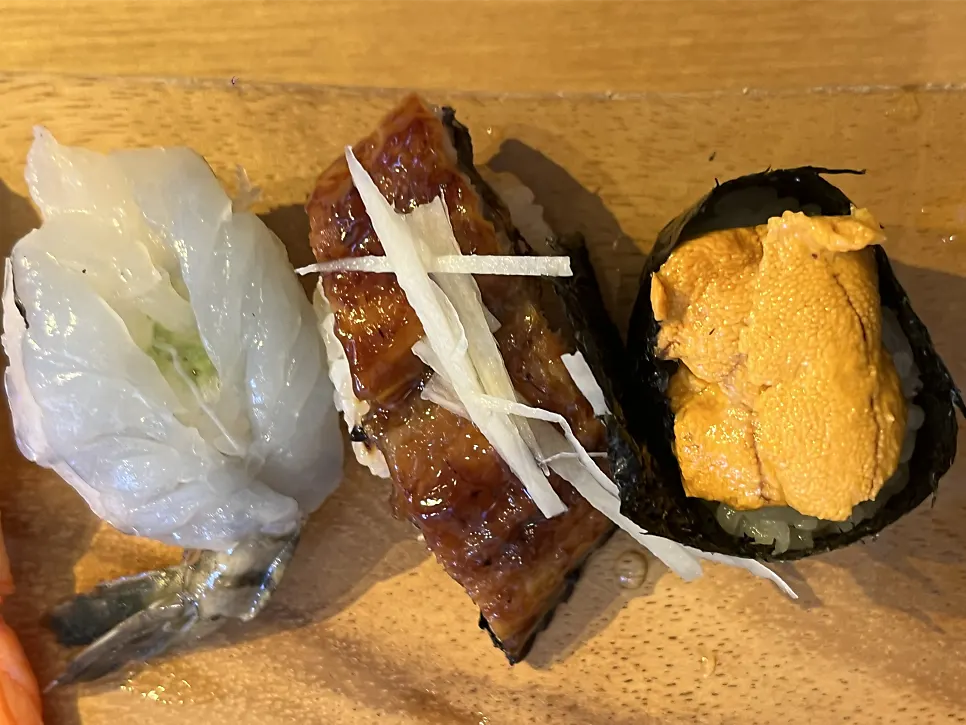 Close-up of sea urchin sushi and eel sushi