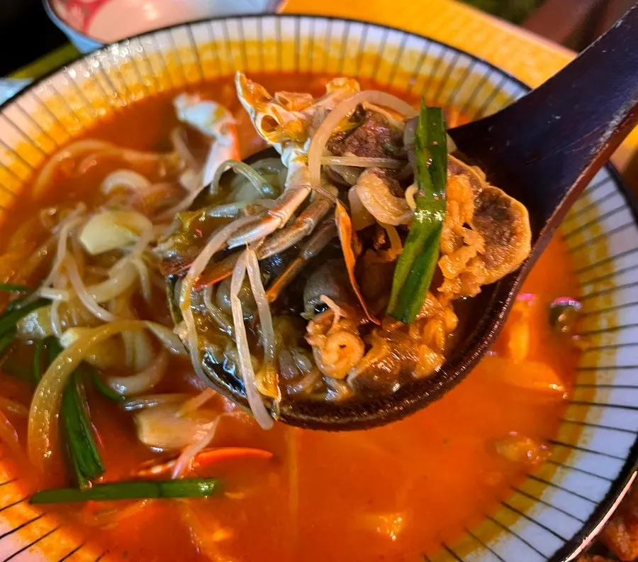 Beef brisket seafood udon with blue crab and seafood