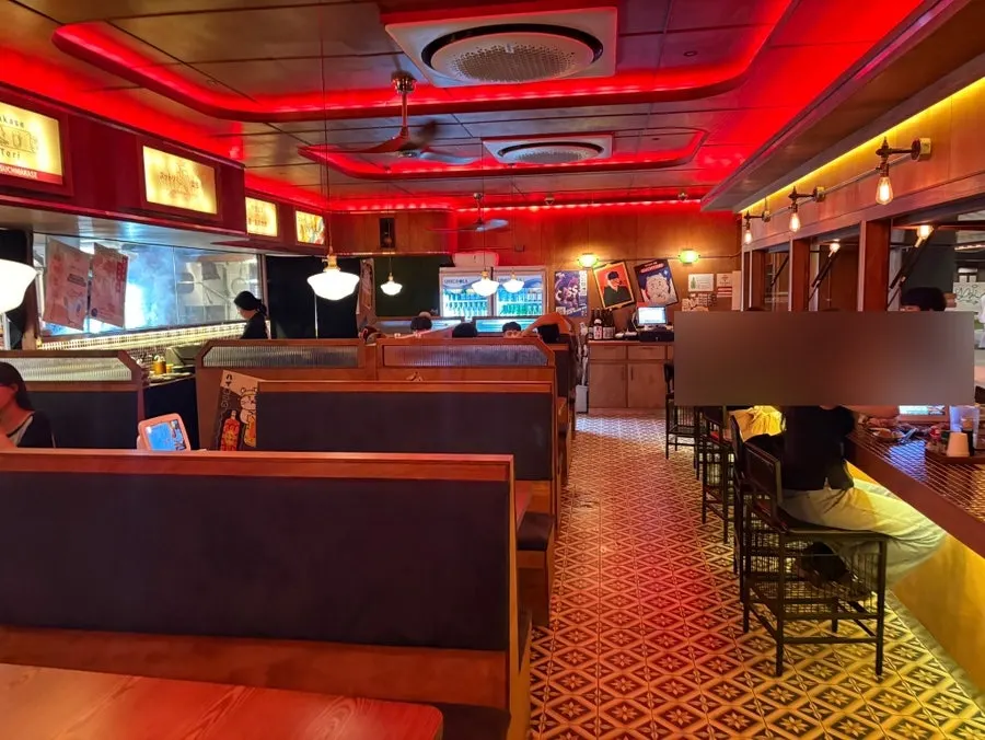 Izakaya interior with a converted-garage feel