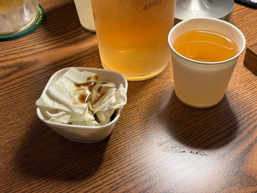 Tea and cabbage salad served as basic sides