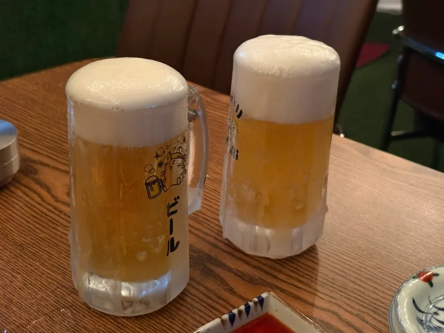 Cold draft beer enjoyed with the skewers
