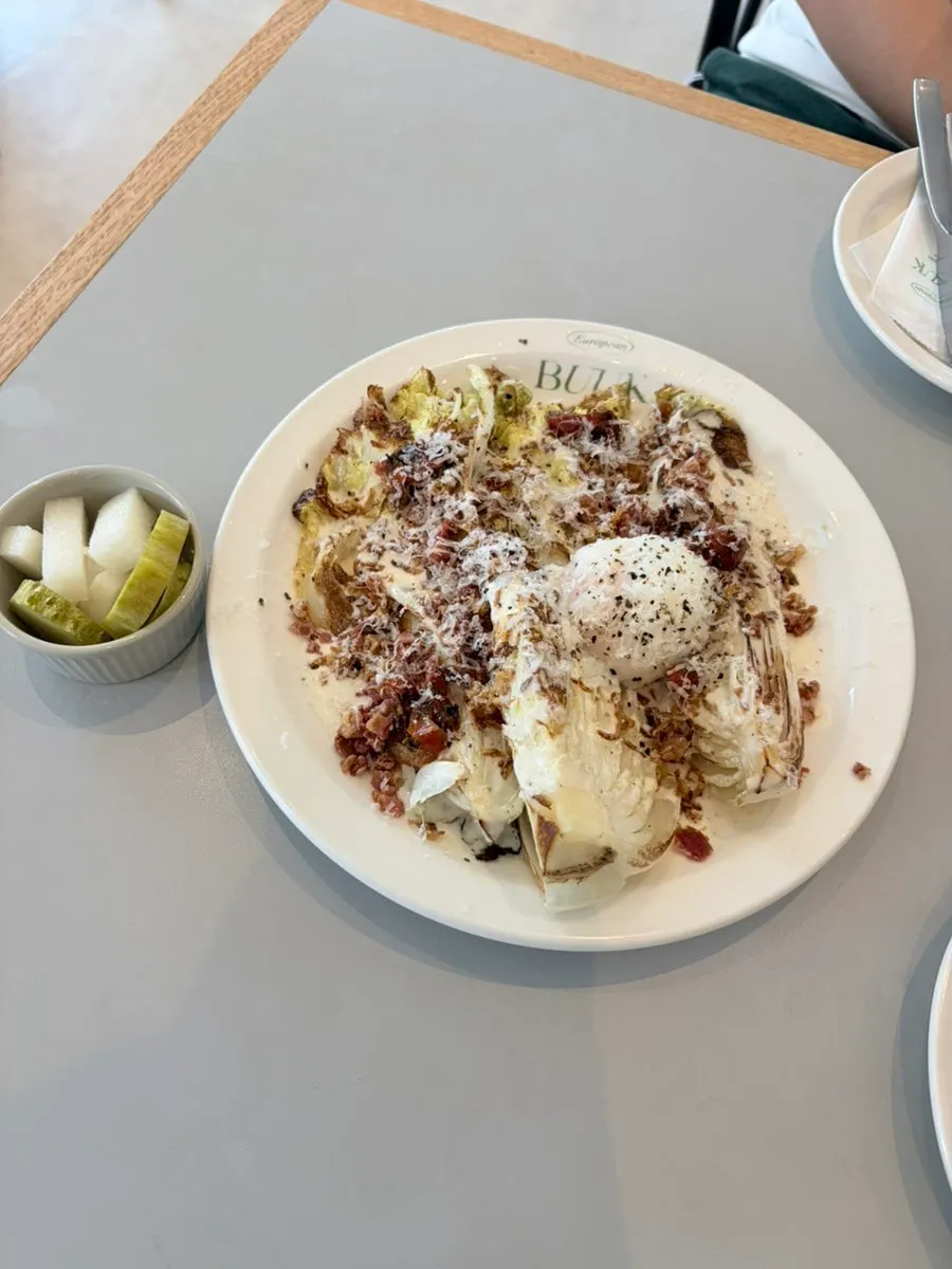 Ordered dishes including cabbage Caesar salad