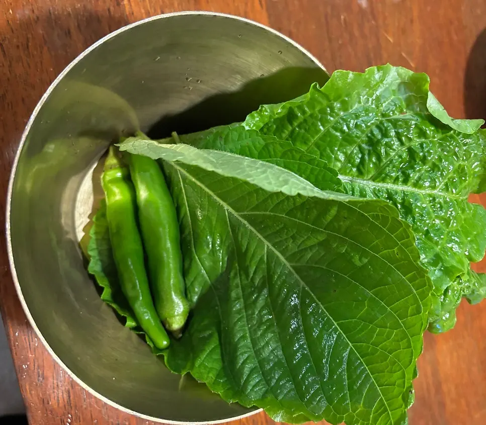 Table set with lettuce wraps and side dishes