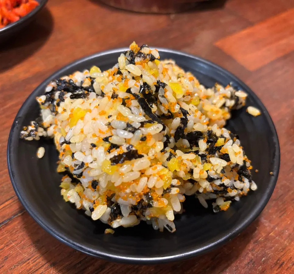 Final table spread with jokbal and flying fish roe fried rice