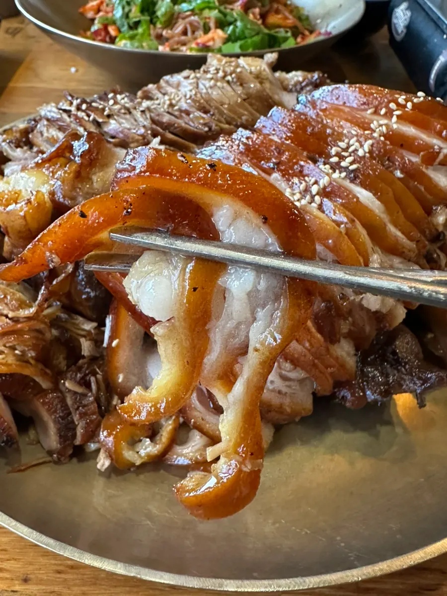 Glossy charcoal-grilled jokbal