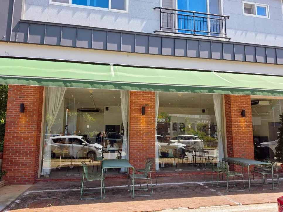 Brick exterior with a large awning