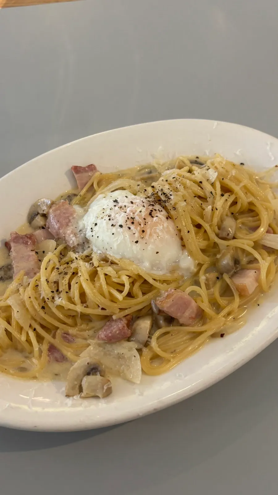 Carbonara with a poached egg