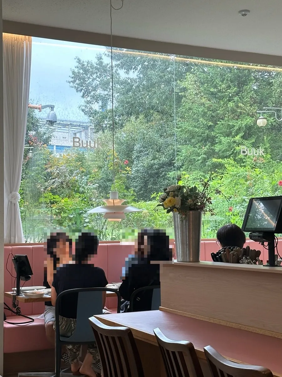 Restaurant interior with a green view