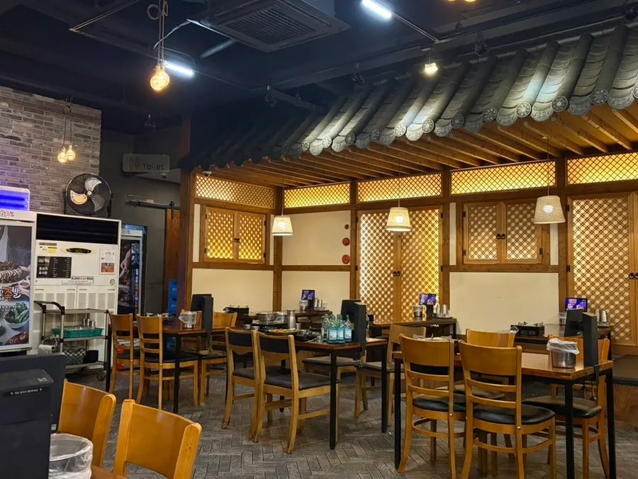 Restaurant interior with hanok-inspired decor
