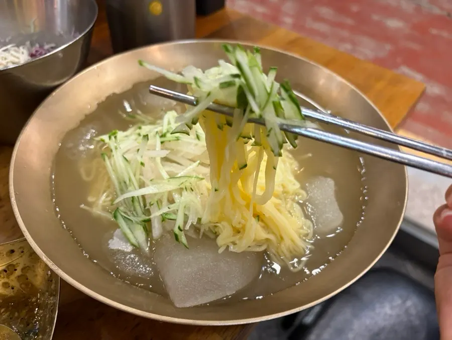 Mul naengmyeon with shredded cucumber and radish