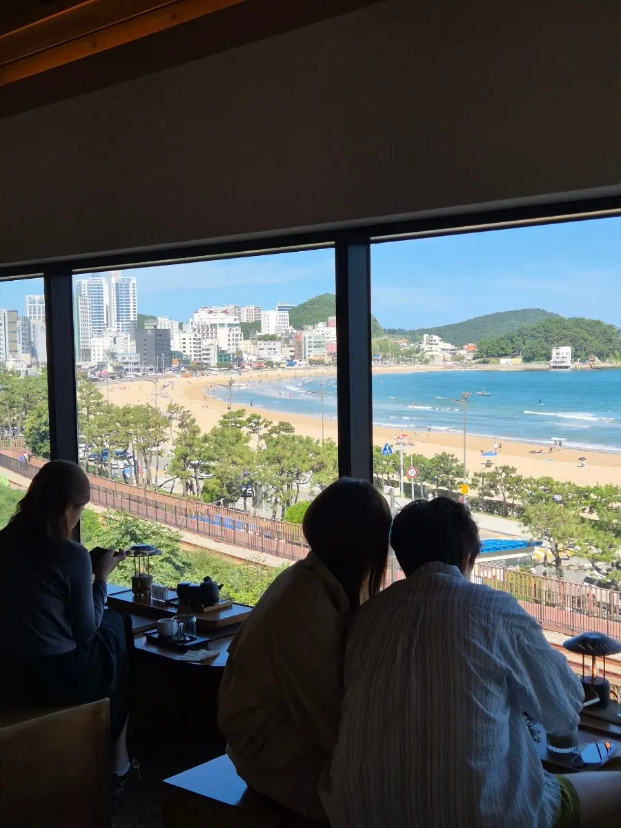 Songjeong beach and railway seen through the large windows
