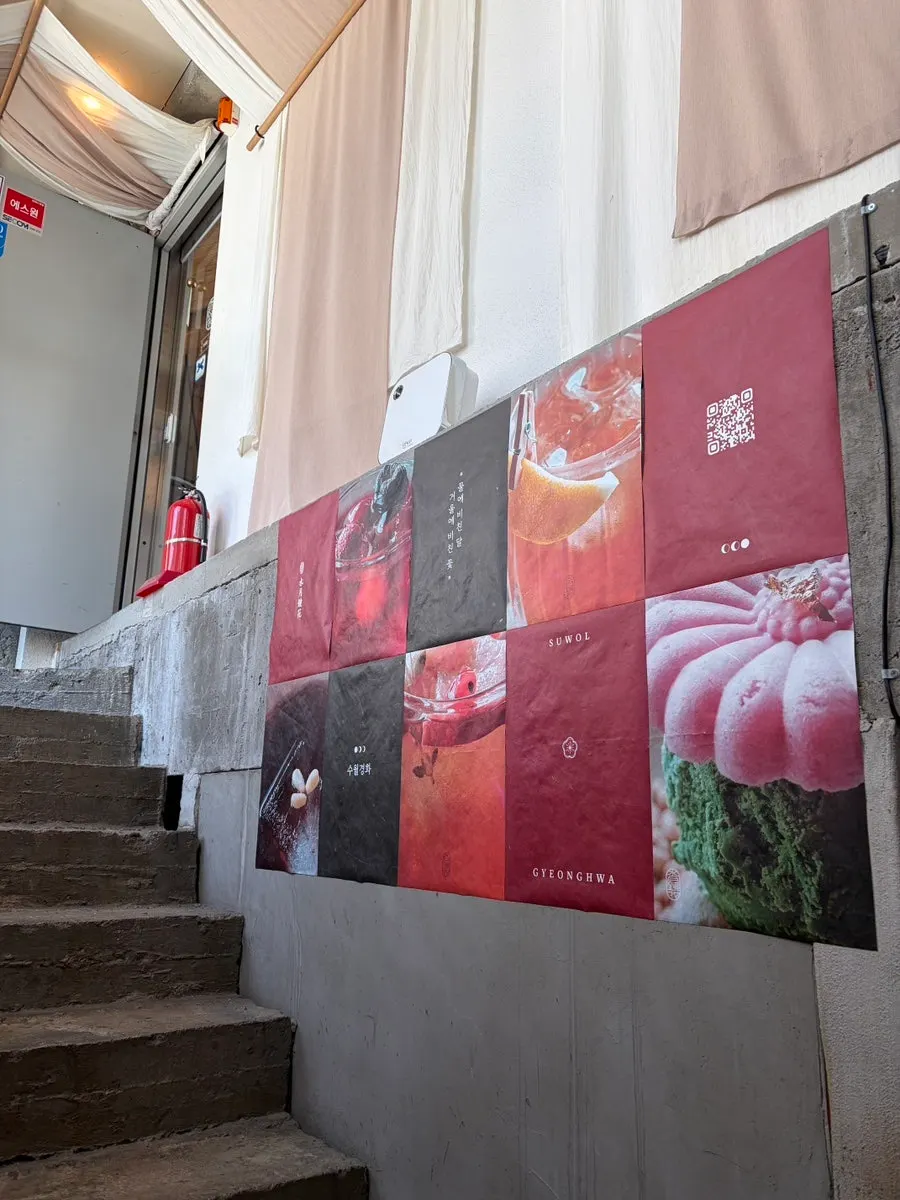 Traditional props along the stairway up to Suwolgyeonghwa