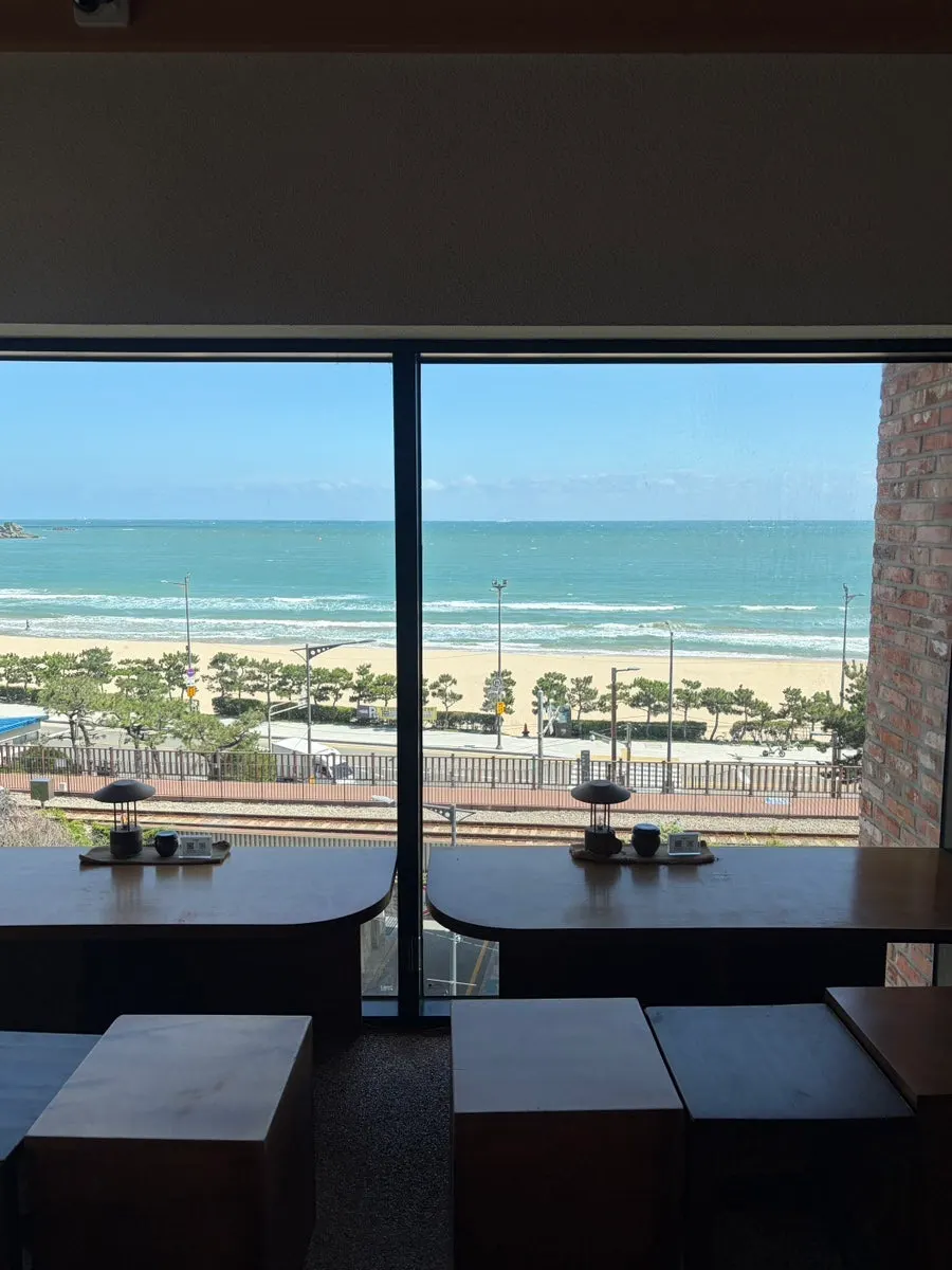 Window seat at Suwolgyeonghwa overlooking Songjeong Beach
