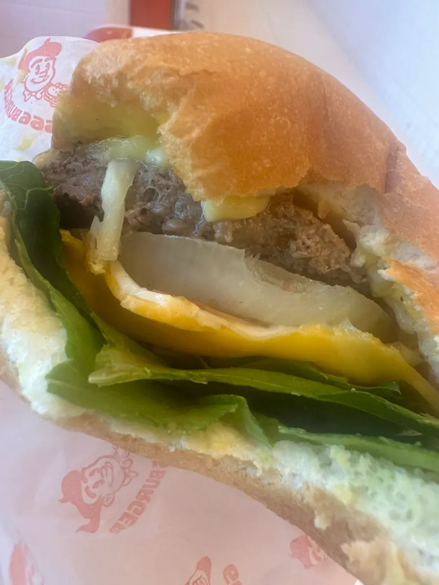 Close-up of the handmade burger showing the soft bun