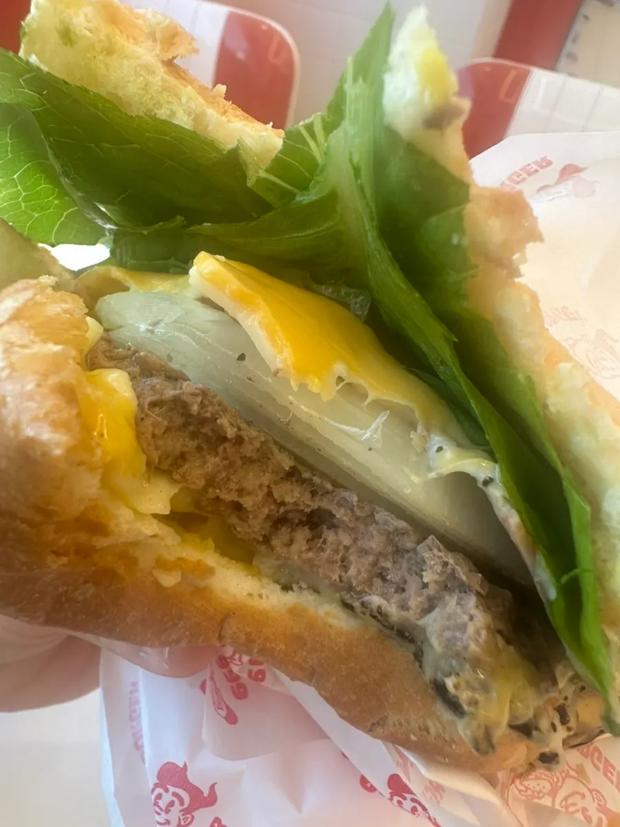 Cheese in the Trap burger and set partly eaten