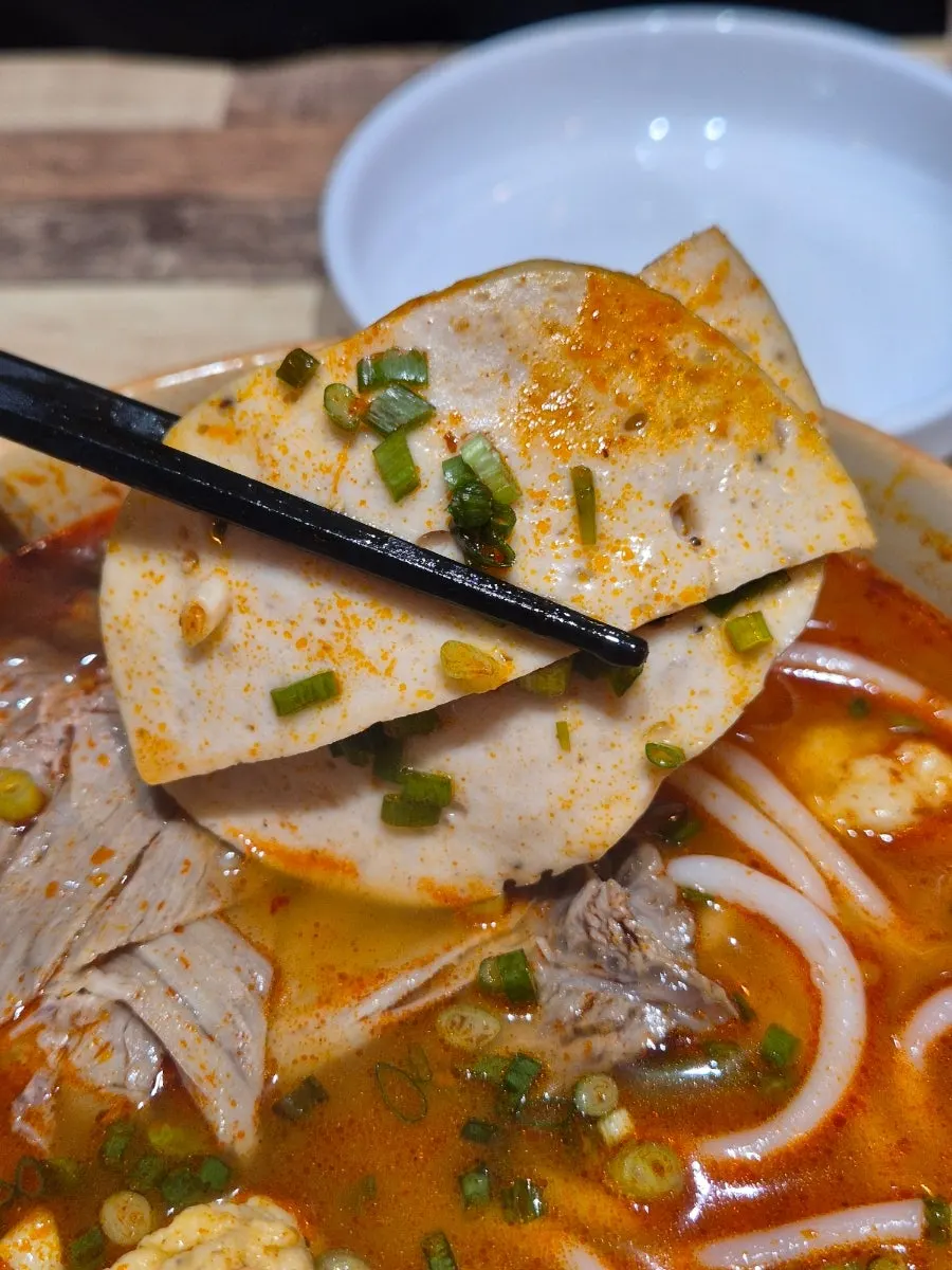 Tangy, peppery bun bo Hue broth