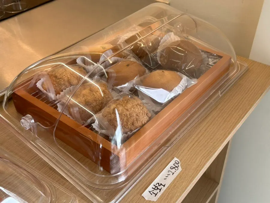 Display case with salt bread and various breads
