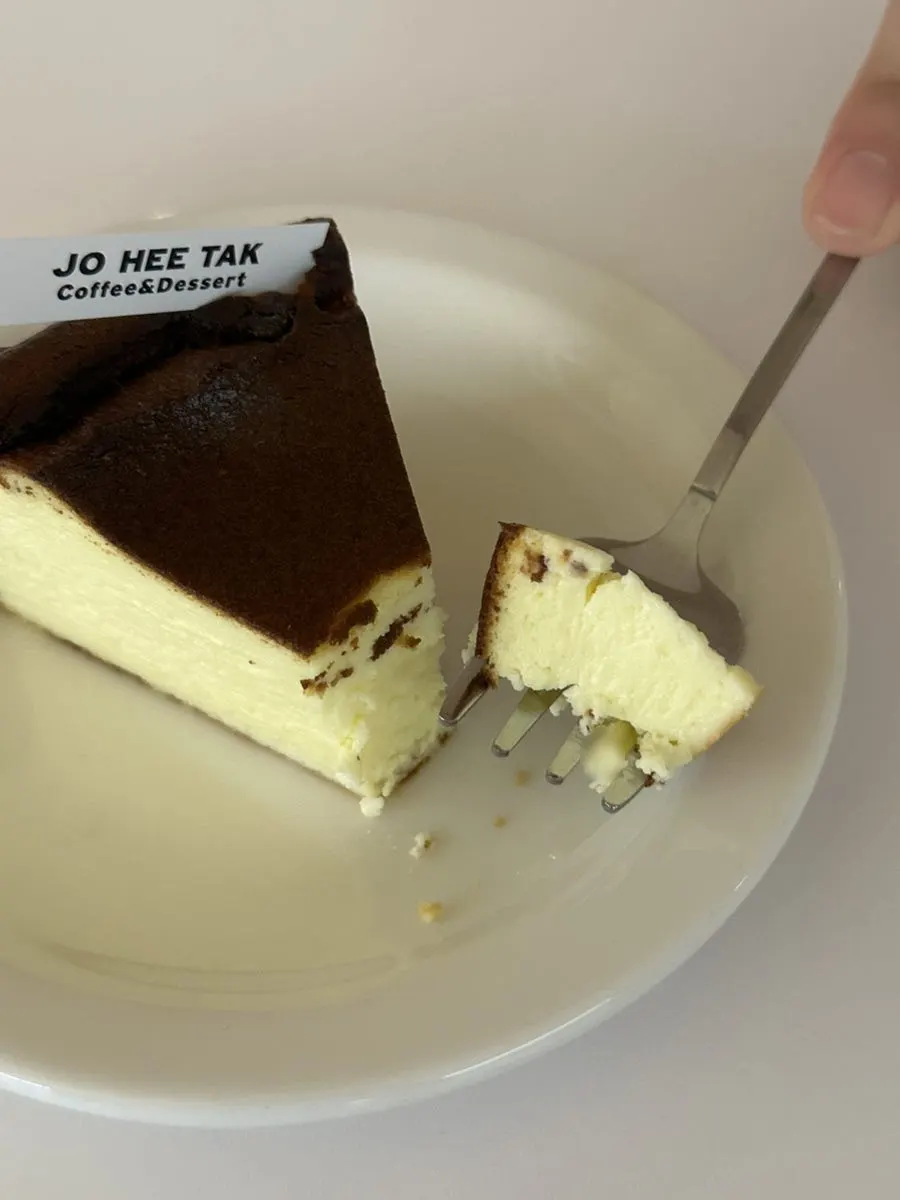 A forkful of Basque cheesecake