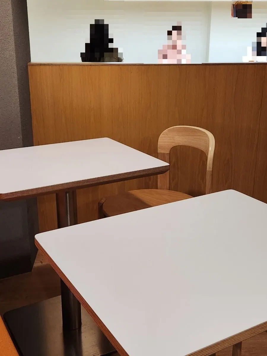 Shared table in the center of the café