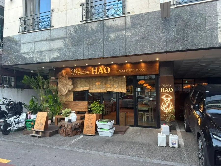 Wide shot of Madam Hao's interior