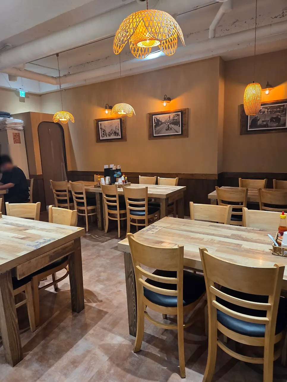 Open, airy semi-outdoor space at Madam Hao