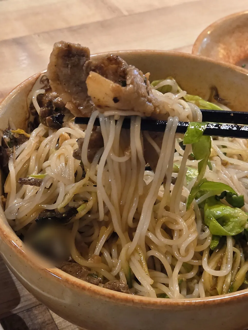 The bulgogi bibim guksu mixed together