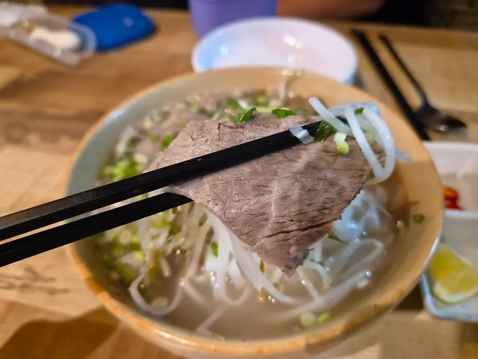 Beef brisket pho generously filled with noodles