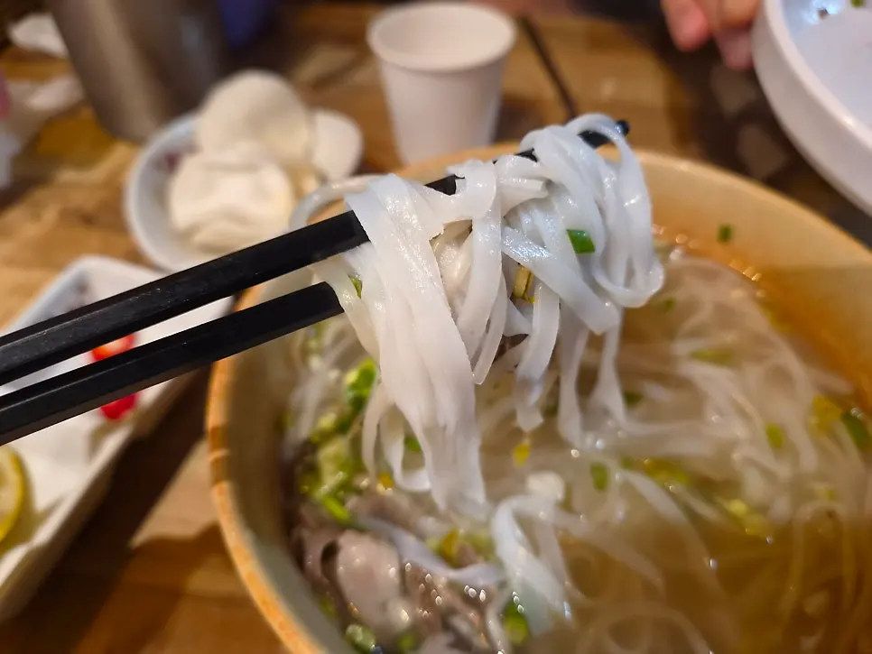 An emptied bowl of Madam Hao pho, broth and all