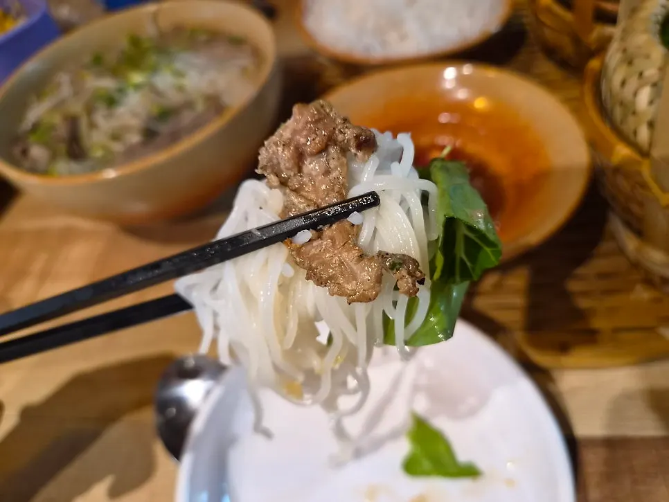 Bun cha served with charcoal-grilled pork and vegetables