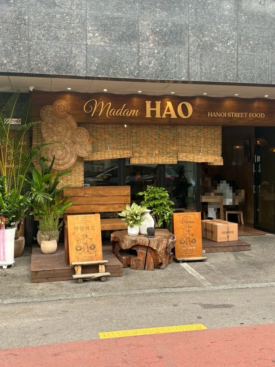 Entrance of Madam Hao with Vietnamese-style interior