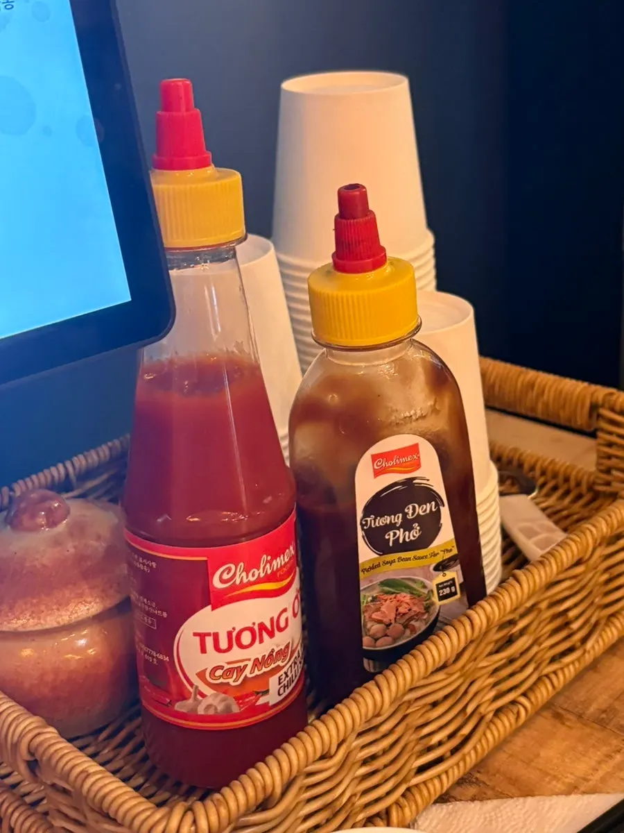 Sauces for pho placed at every table