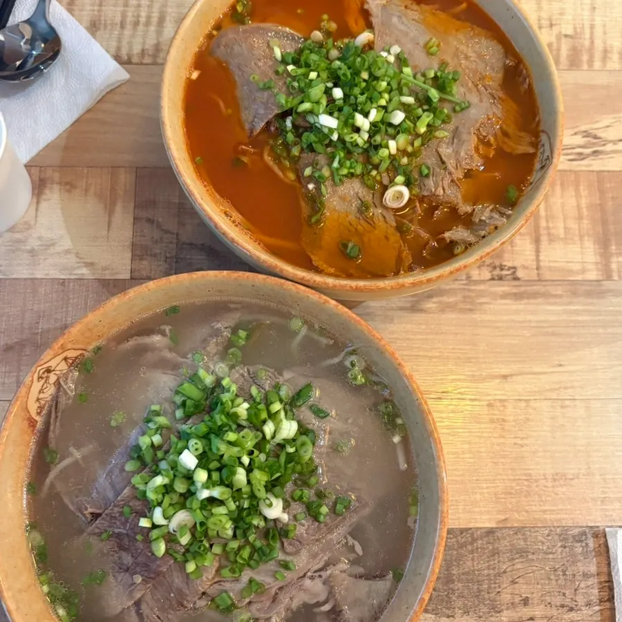 Beef brisket pho packed with noodles and toppings