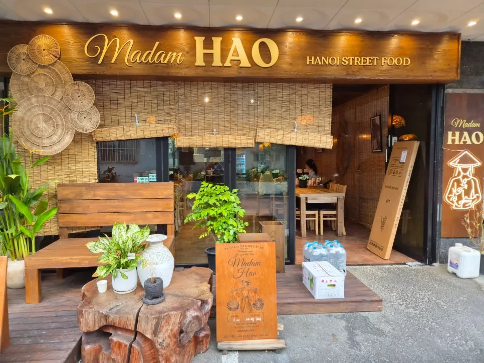 Generously spaced table seating at Madam Hao