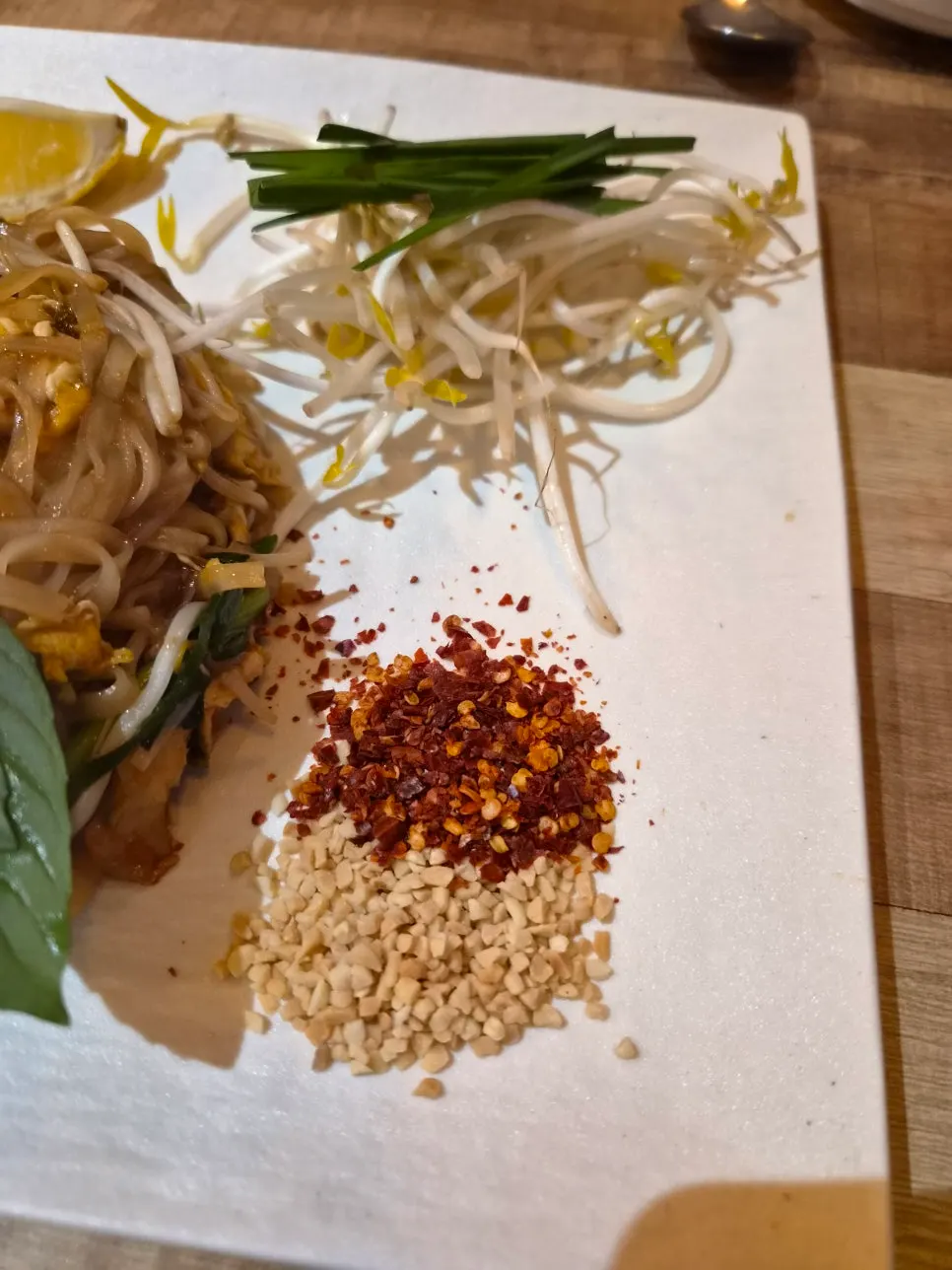 A chopstickful of pad thai lifted up