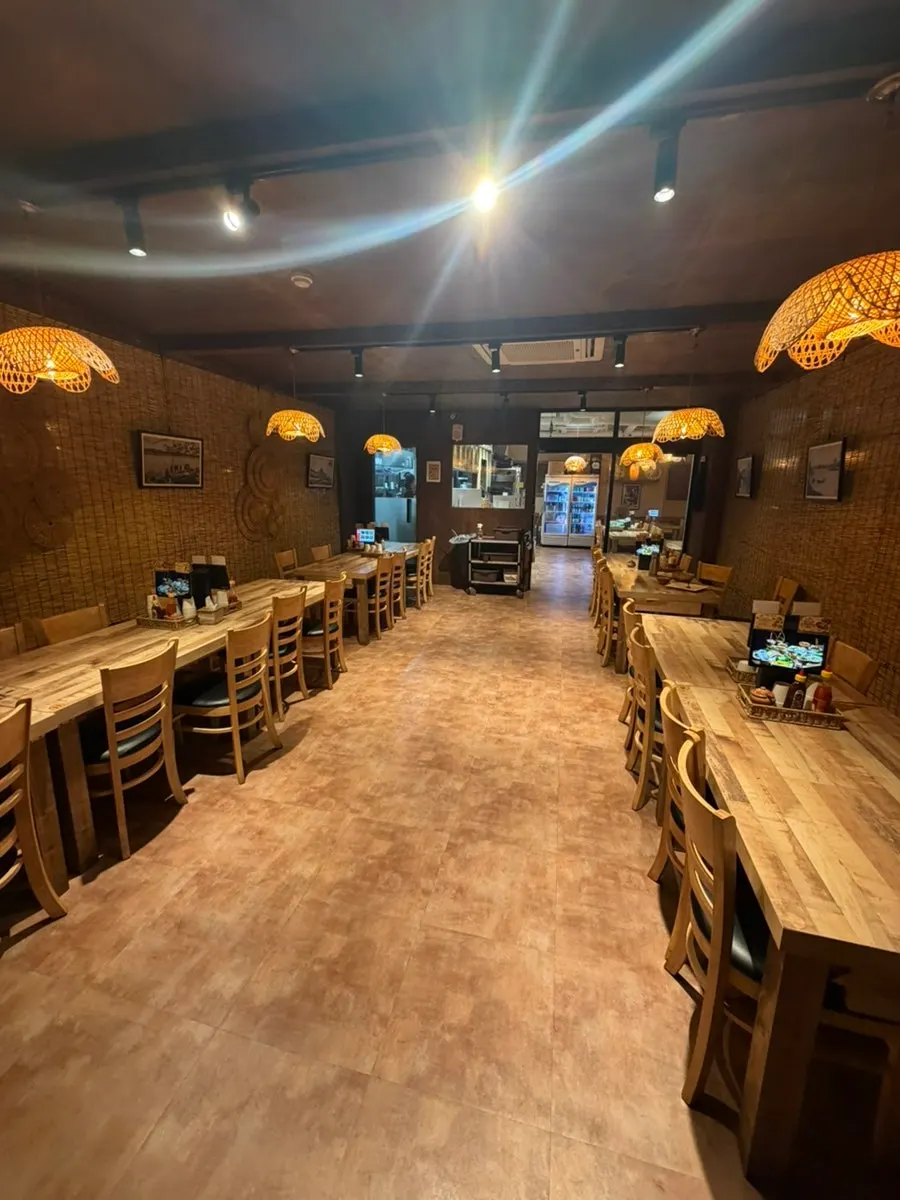 Interior of Madam Hao with wooden tables