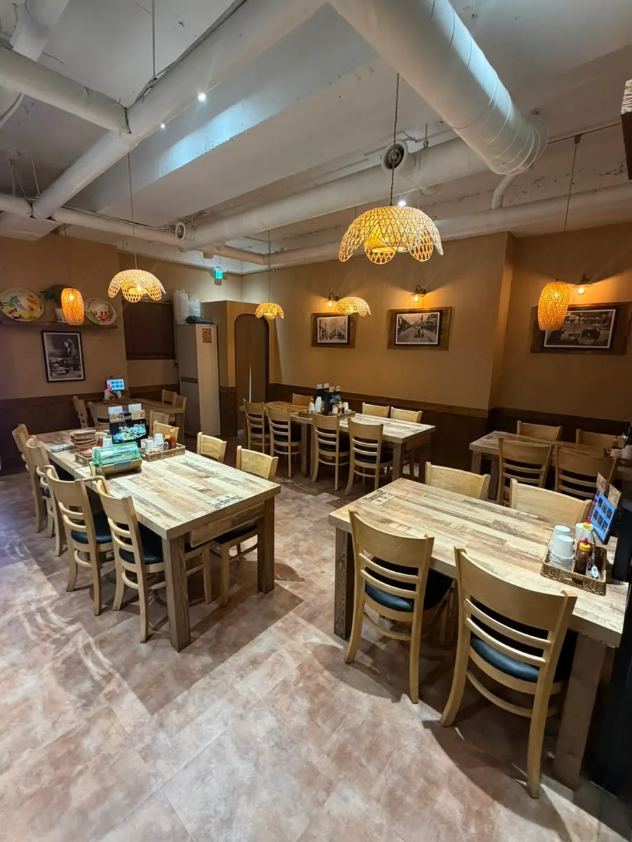 Interior of Madam Hao with green-toned decor