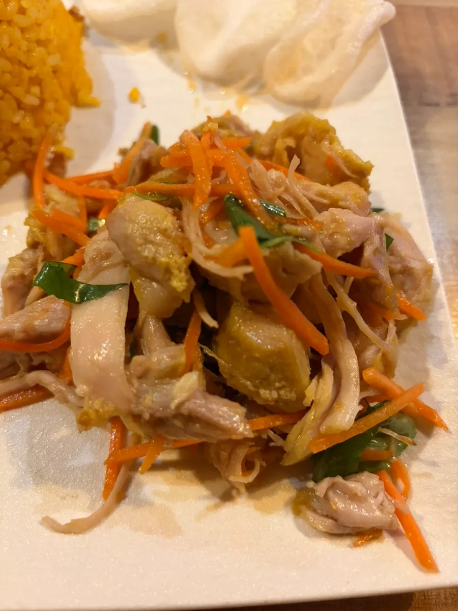 Chicken rice bowl plate with side vegetables