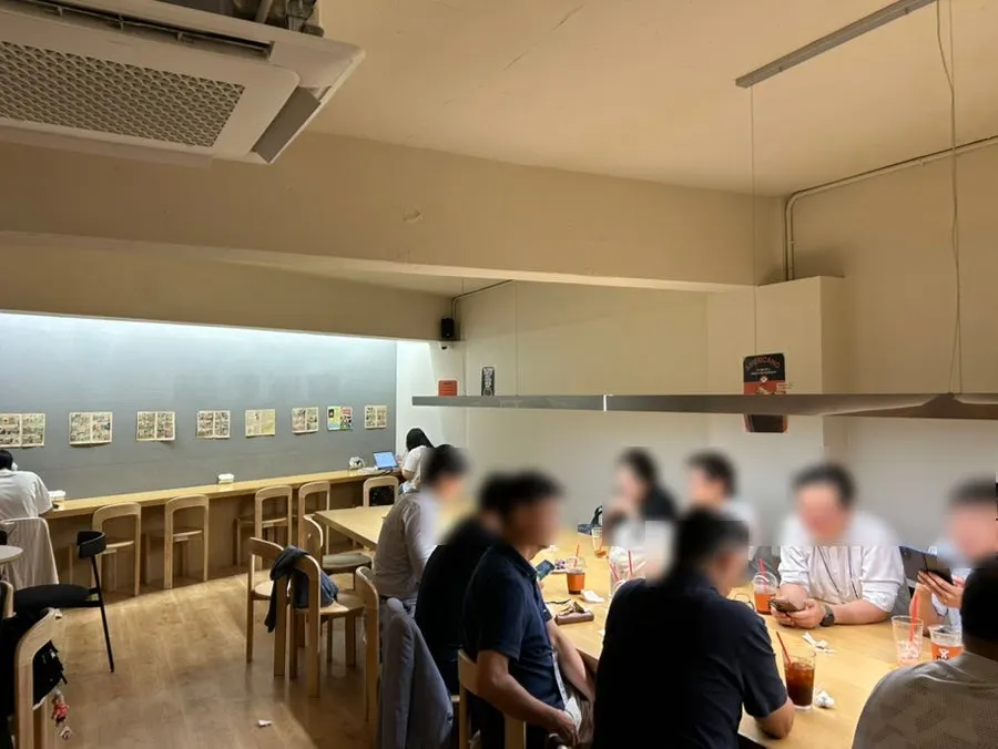 Group table and seating area at Jo Hui-tak Coffee